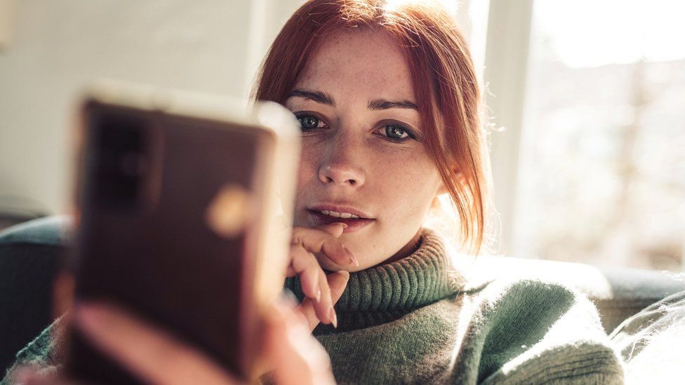 Woman looking at phone