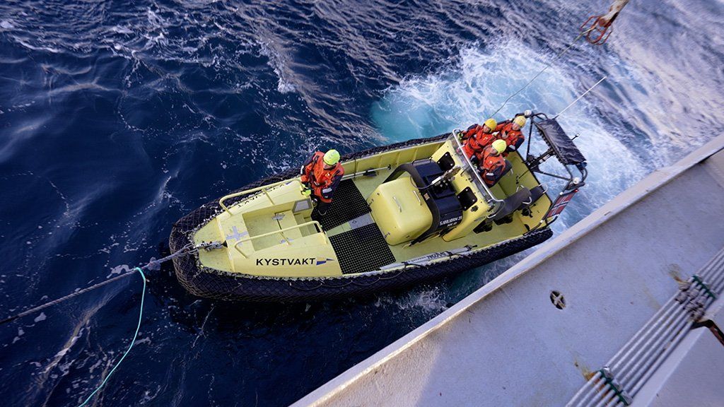 Katya onboard a jet propelled dinghy