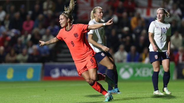 Rachel Daly celebrates scoring for England against Norway