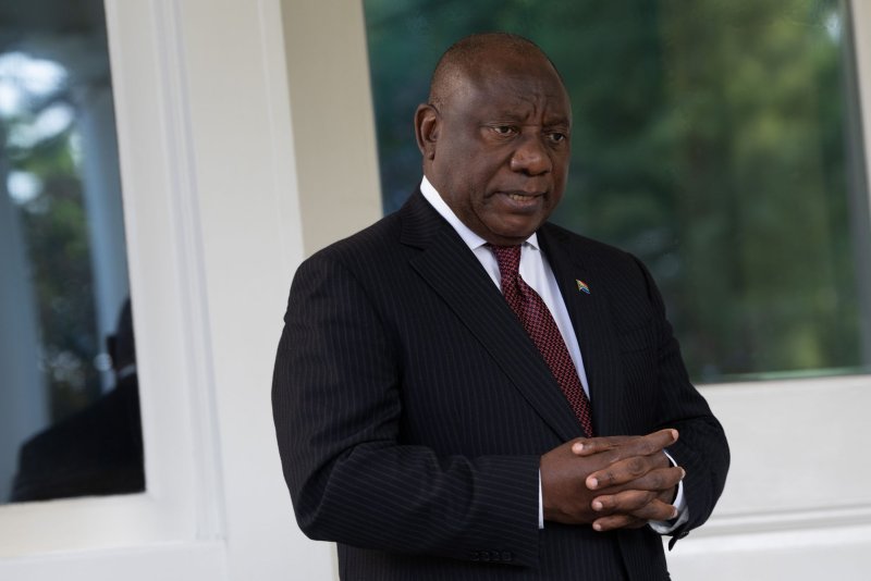 South African President Cyril Ramaphosa chats at Vice President Kamala Harris's Official Residence in Washington, D.C., on September 16. He won re-election to lead the African National Congress on Monday. File Photo by Chris Kleponis/UPI | <a href="/News_Photos/lp/5e00096d64ac45ff38f3a00e7448304f/" target="_blank">License Photo</a>