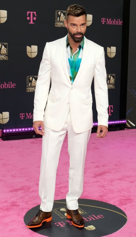 Ricky Martin walks the red carpet at the Univision 2020 Premio Lo Nuestro award show at the American Airlines Arena in Miami on February 20, 2020. The singer turns 51 on December 24. File Photo by Gary I Rothstein/UPI | <a href="/News_Photos/lp/1b9ffe5cc78c3071dd4c6c7caa25aabe/" target="_blank">License Photo</a>