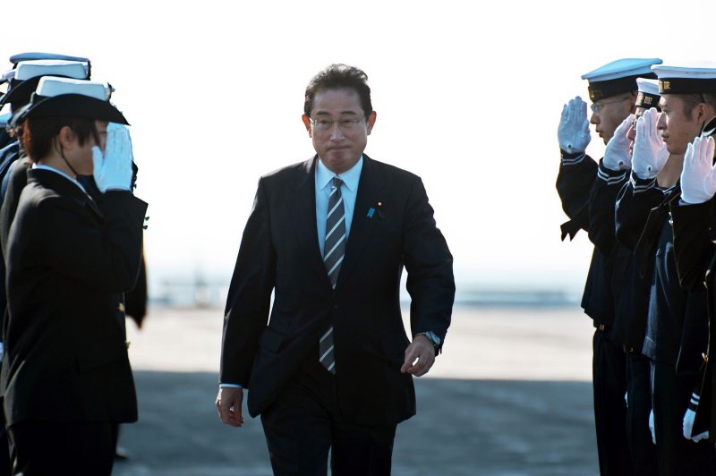 Japan's Prime Minister Fumio Kishida aboard Japan Maritime Self-Defense Force's helicopter MCH-101 on the helicopter carrier Izumo at Sagami Bay in Kanagawa-Prefecture, Japan on November 6. He said Japan will increase its defense budget in the face of unprecedented threats. Photo by Keizo Mori/UPI | <a href="/News_Photos/lp/2a075f3465643612464f7c78a6282276/" target="_blank">License Photo</a>