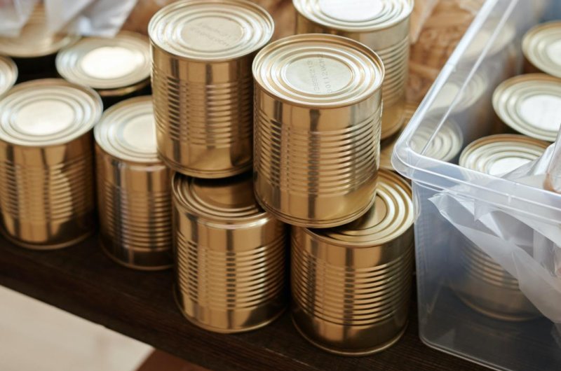 Fourth-grader Liam Kalbskopf broke the Guinness World Record for most cans stacked into a pyramid in 30 seconds. <a href="https://www.pexels.com/photo/a-close-up-shot-of-food-donations-6994962/">Photo by Julia M Cameron/Pexels.com</a>