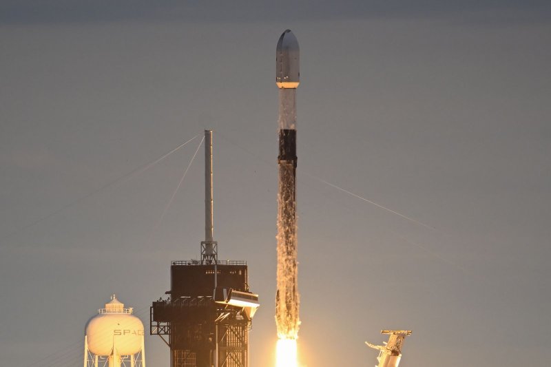 A SpaceX rocket carrying 54 of company's Starlink communications satellites lifts off from Kennedy Space Center in Florida at 4:32 p.m. Saturday. Photo by Joe Marino/UPI | <a href="/News_Photos/lp/f21a15544a1c84a4cfdba43f7f9fb399/" target="_blank">License Photo</a>