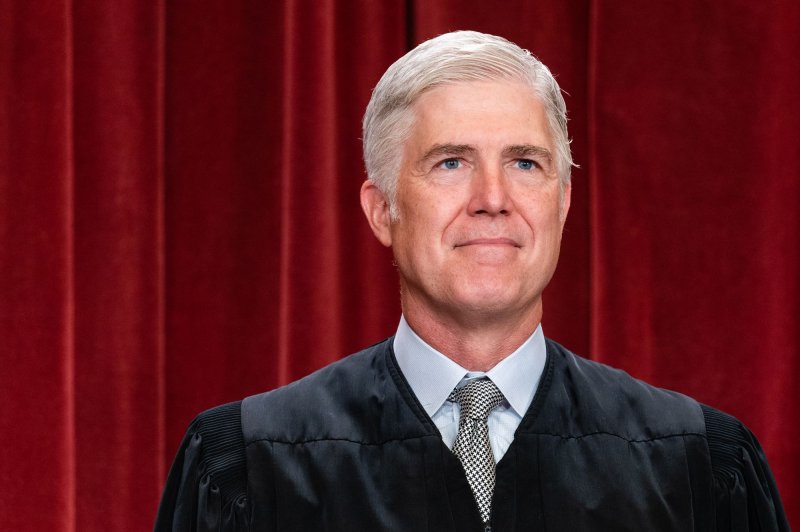 Associate Justice Neil Gorsuch broke from conservative justices Tuesday, voting against a stay for Title 42 to no avail as the court ruled 5-4 to keep the rule in place while it awaits oral arguments in February. File Photo by Eric Lee/UPI | <a href="/News_Photos/lp/9e84d260dec060004af44d09c1787f6e/" target="_blank">License Photo</a>