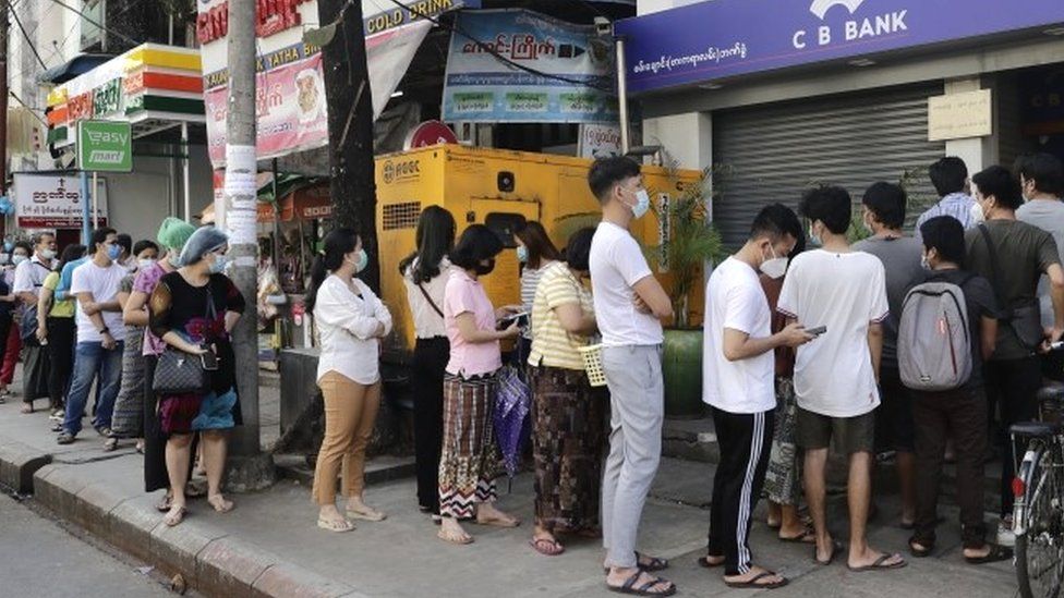 People line up outside a bank branch in Yangon, Myanmar, 1 February 2021.