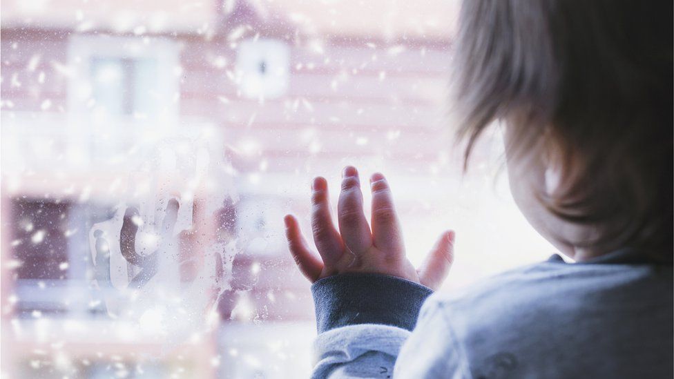 Child at a window