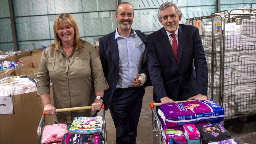 Pauline Buchan, John Boumphrey and Gordon Brown at the Amazon warehouse in Lochgelly