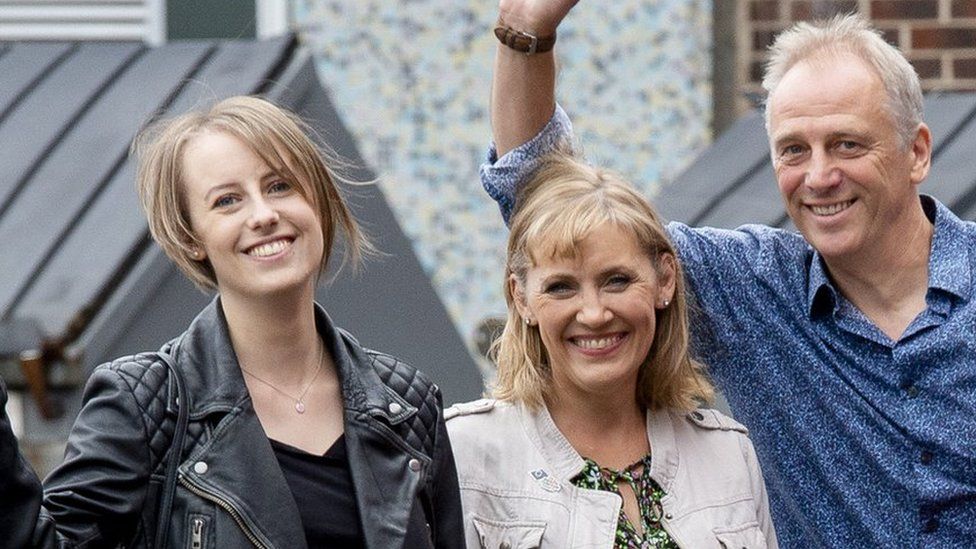 Laura Nuttall (left) with mum Nicola and dad Mark