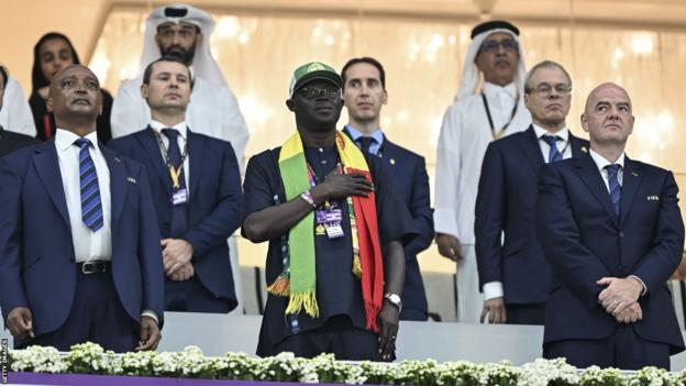 Fifa president Gianni Infantino (R), Patrice Motsepe, President of the Confederation of African Football, (L) and Augustin Senghor, Senegalese FA president