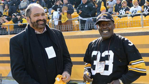 Franco Harris pictured with John Fuqua in 2012 at a ceremony commemorating the 40th anniversary of Harris' 'Immaculate Reception'