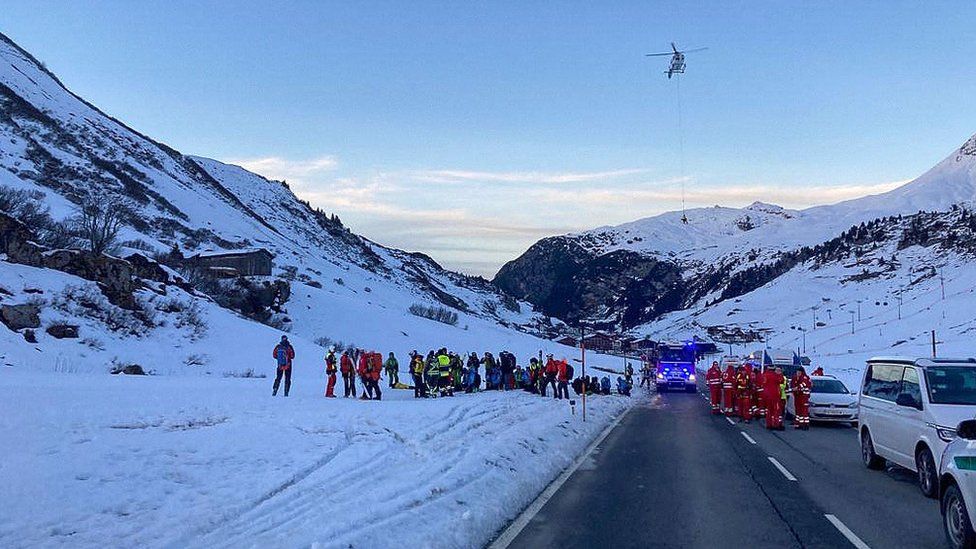 Emergency services working near the scene of an avalanche at Bregenz, Austria