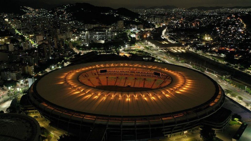 Maracana stadium in Rio de Janeiro lit up in gold in honour of Pele