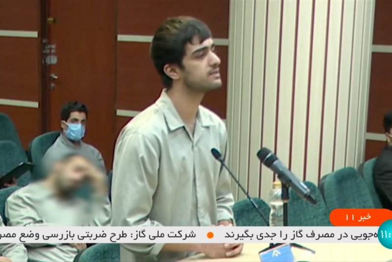 A TV grab taken from Iranian state TV on Saturday shows Mohammad Mahdi Karami attending a court hearing in Karaj, Iran, on December 5, 2022. He and another man were executed for killing a member of Iranian paramilitary forces. Photo by Iranian state TV/EPA-EFE