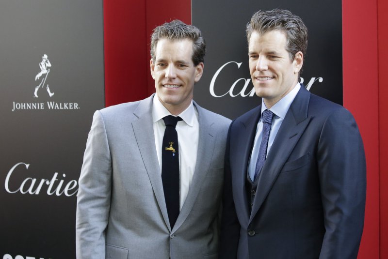 Cameron Winklevoss and Tyler Winklevoss arrive on the red carpet at the 'Ocean's 8' premiere in New York City in 2018. In 2015, the twins founded the crypto firm Gemini. File Photo by John Angelillo/UPI