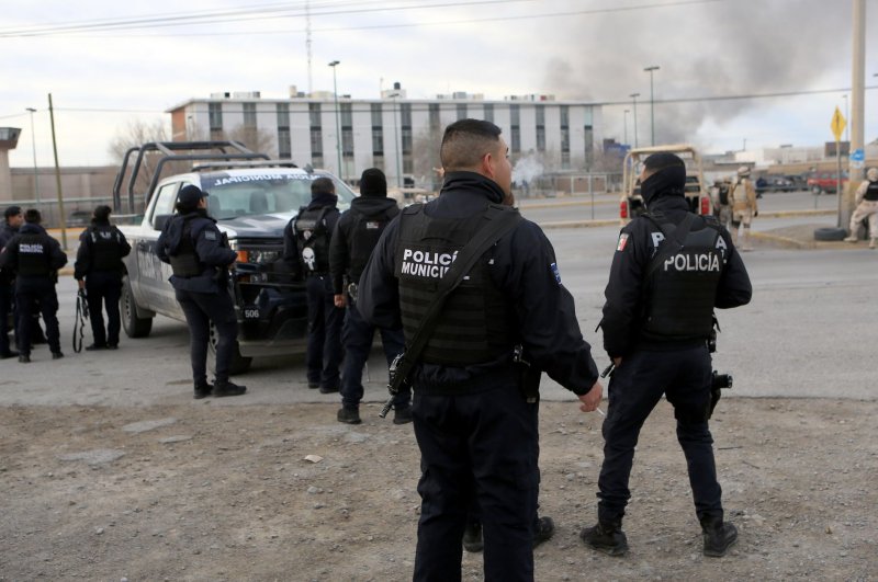 A shootout between gunmen and Mexican authorities has resulted in seven deaths in Ciudad Juarez. The authorities were looking for escapees from a mass prison break on Sunday when they came under fire. Photo by Luis Torres/EPA-EFE