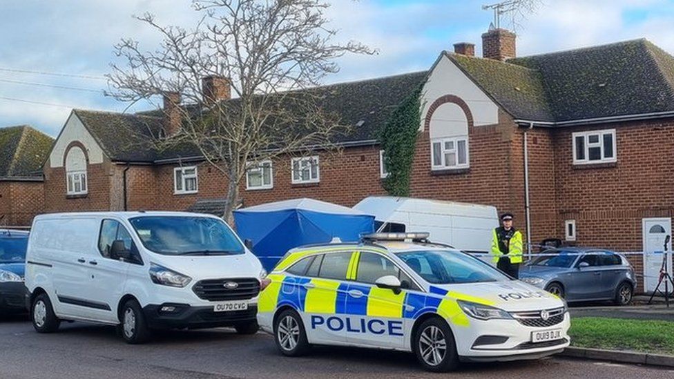 Police officer outside Howard Road, Banbury