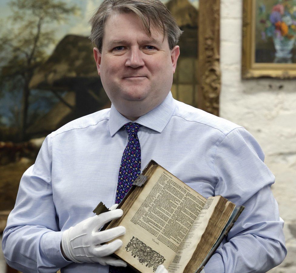 Bloomfield Auctions managing director Karl Bennet with the Geneva Bible