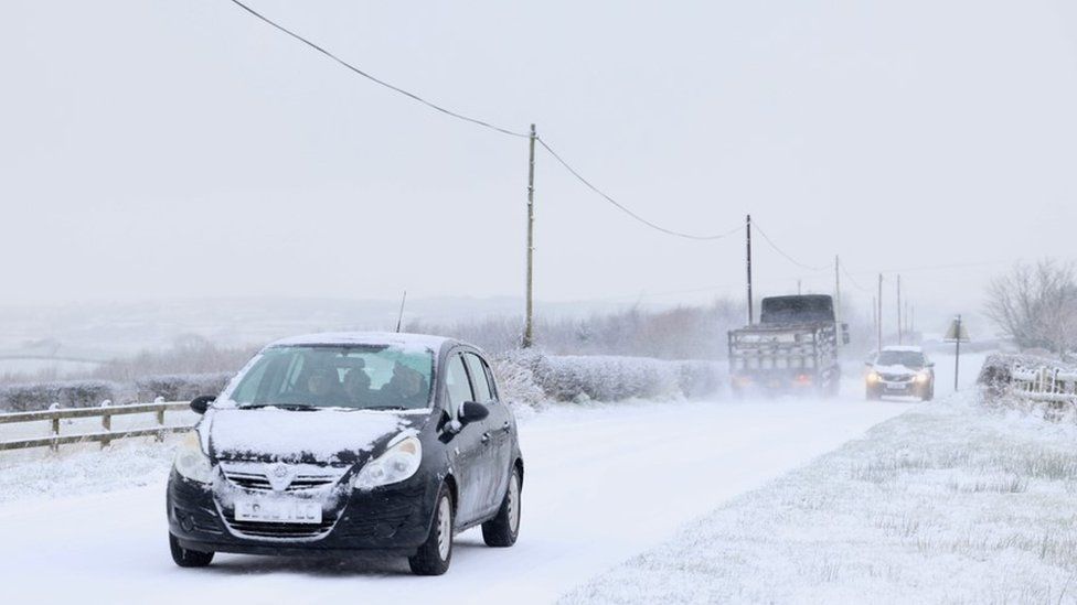 Cars driving in snow