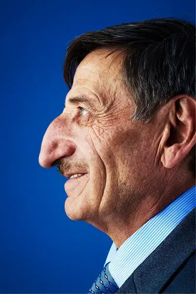 mehmet ozyurek poses side on to show his nose