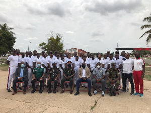 GFA President Kurt Okraku in a group photograph with officers of the Ghana Armed Forces