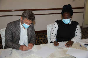 Dr. Augustina Odame signing the MoU with GIZ