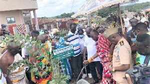 Nana Otuo Siriboe II, Juabenhene performing a ceremonial tree planting exercise