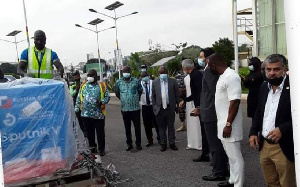 Health Minister Kwaku Agyemang Manu receiving the first batch of 16,000 Sputnik vaccines