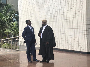 Dr Stephen Kwabena Opuni with his lawyer