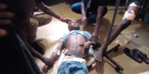 One of the injured persons receiving treatment on the floor