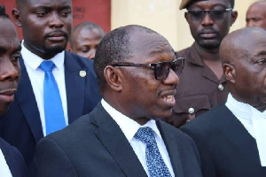 Justice Clemence Honyenuga (middle) is a Supreme Court judge