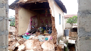 A photo of a collapsed building