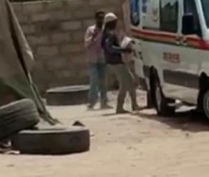 A photo of the ambulance being loaded with cement