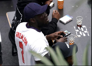 Rapper Stormzy in his England replica jersey