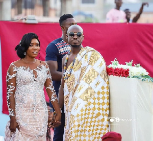 Eugene Osafo-Nkansah with his wife during their wedding