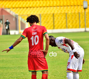 Asante Kotoko midfielder, Fabio Gama Dos Santos and Accra Hearts of Oak's Patrick Razak