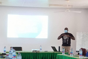 Ibrahim Akalbila, the Coordinator of GTLC during a presentation at a program in Wa