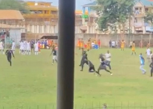 BA United supporters marching to assault the referee during the match