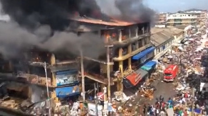 The fire ravaged a three-story building consuming goods and cash at the Makola market