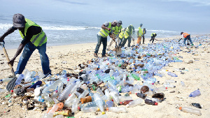 The two children are picking up litter in their neighborhoods as part of the initiative