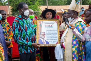 Minister of Education, Dr Yaw Osei Adutwum receiving his citation