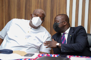 Samuel Abu Jinapor interacting with Henry Quartey at the event