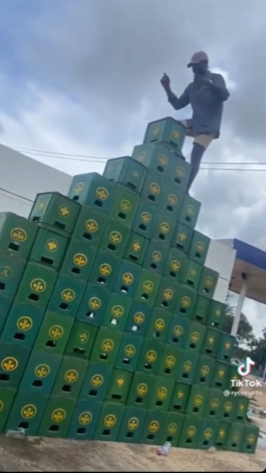 The Ghanaian man captured climbing the crates