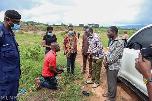 A self-acclaimed surveyor who was spotted on site was arrested