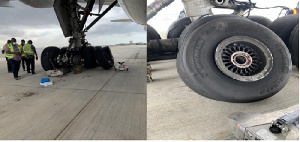 Officers inspect the tyre area of the aborted KLM flight