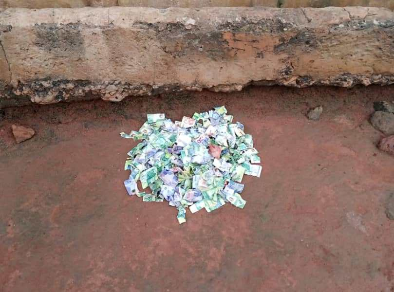 The torn currency notes depoisted behind Yaw Baah's house