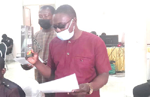 The two taking their oaths when they appeared before the PAC in Sunyani