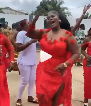 The happy bridesmaid singing Black Sheriff's second sermon with her friends