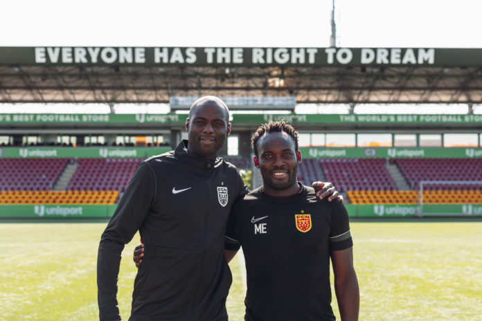 Djimi Traore with Michael Essien