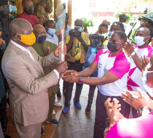 GOC President, Ben Nunoo Mensah passing on the baton to Otumfuo